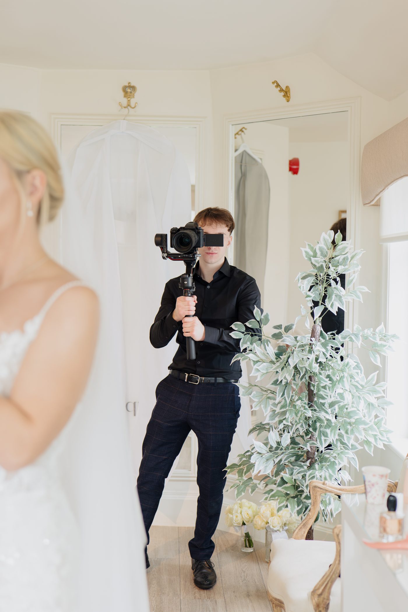 Lucas filming at a wedding